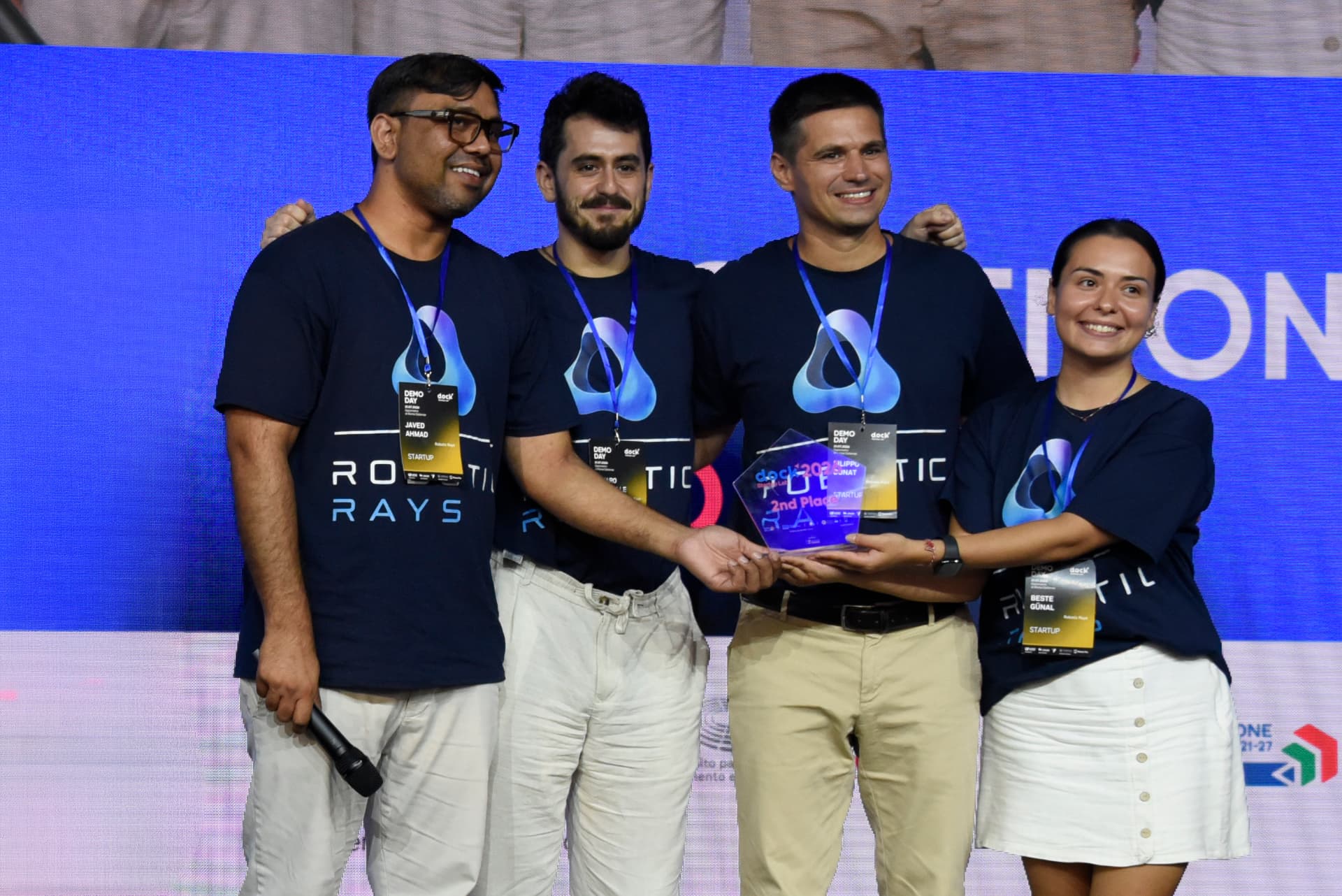 Startup team celebrating its Demo Day award